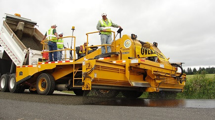 Chip sealing a road in north Clark County.
