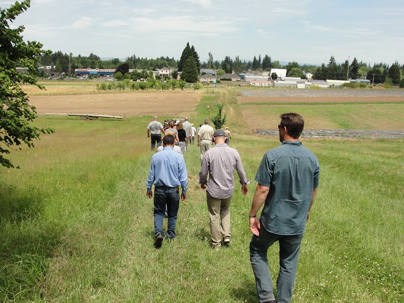 Group touring the 78th Street Heritage Farm.