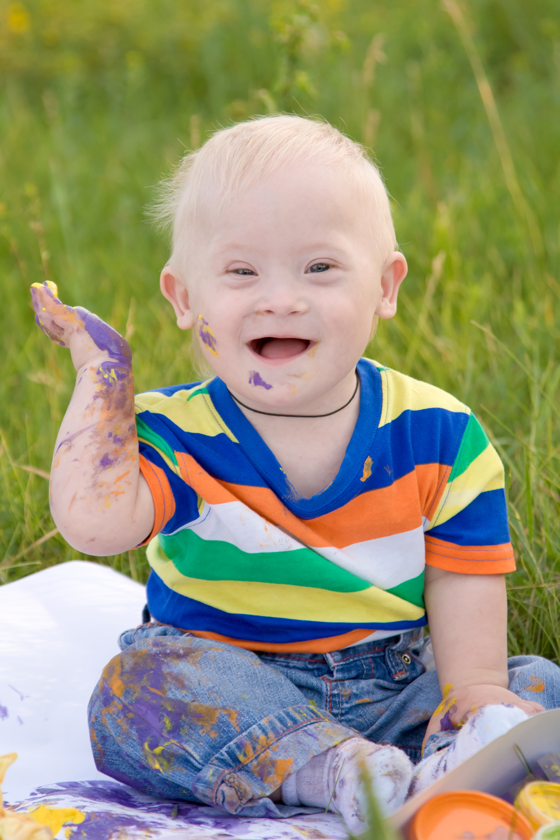 Child with Special Needs Finger Painting