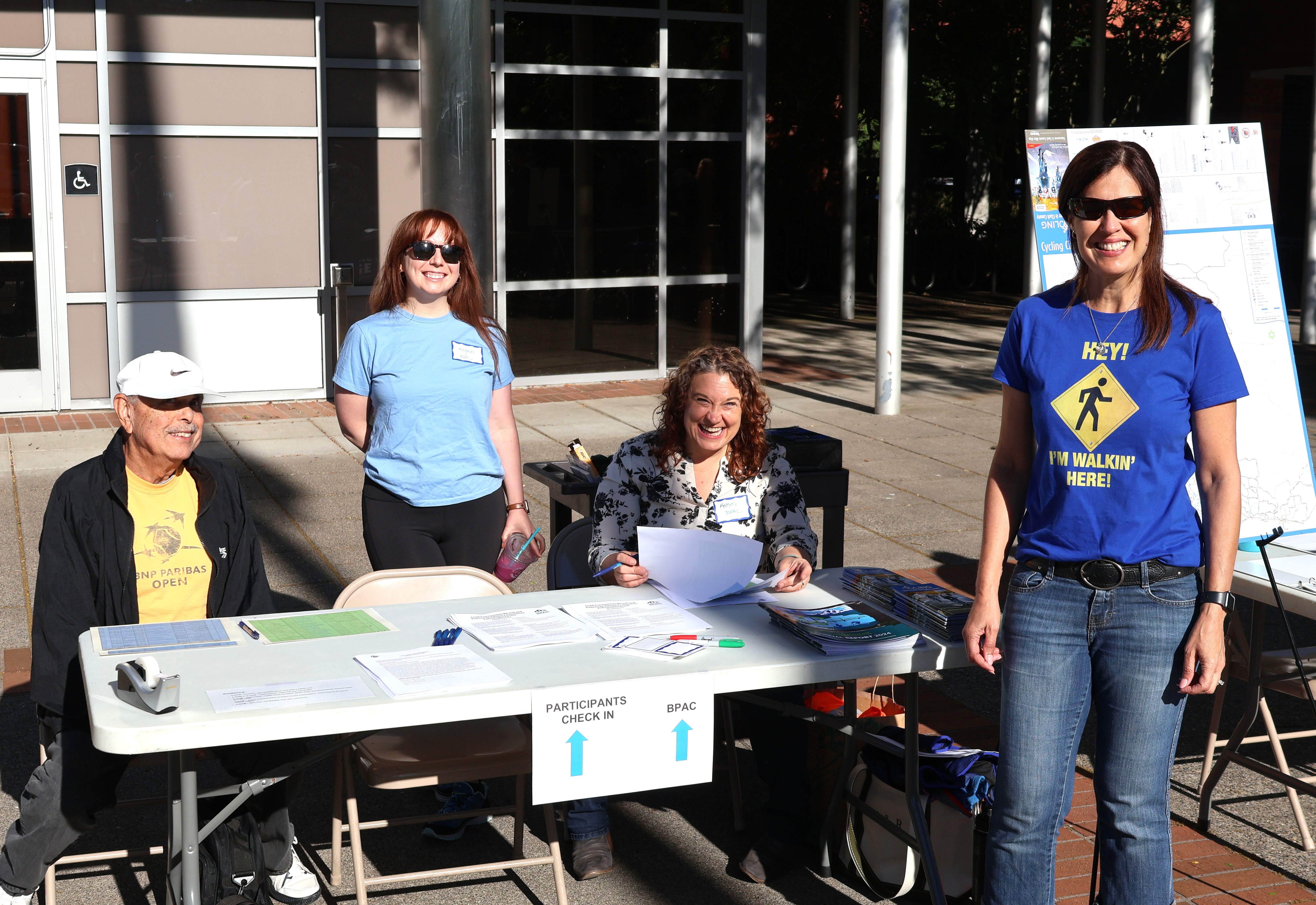 Committee members tabling at an event.