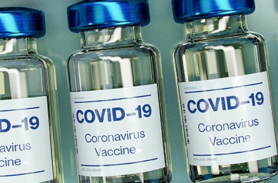 Row of bottles for the covid-19 vaccine.
