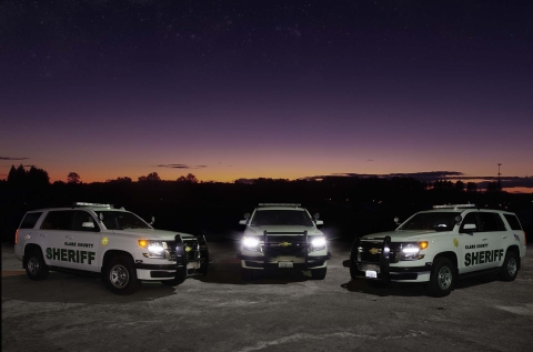 Three Patrol Cars at Sunset